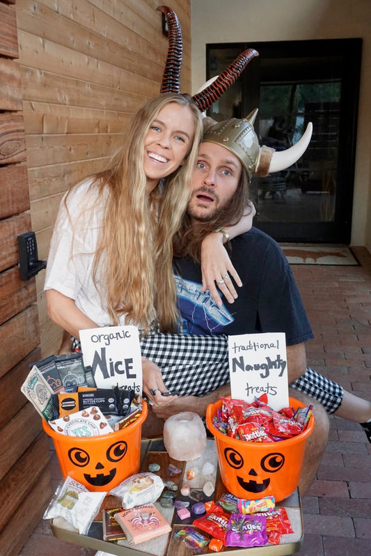 It's Halloween. Noah (Founder) and Brittany (Creative Producer) sit together with Jack-o'-lantern buckets full of naughty and nice treats.